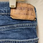 Levi's Levi’s woman’s size 30W 32” inseam relaxed fit boot cut jeans Photo 3