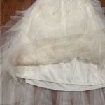 Soho Apparel  Elegant Cream High-Low Skirt Photo 8