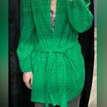 Size medium green dress with wraparound tie. Photo 1