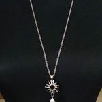 Genuine Howlite Sun Pendant Necklace Silver Metal Jewelry Memory Knowledge Aid Photo 0