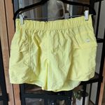 Free People FP Movement In The Wild Shorts butter Yellow pockets workout elastic Size M Photo 1