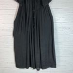 Get ready for the perfect beach party in this ruffle cover up. has an attracted deep V Photo 2