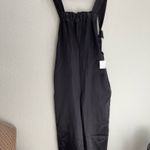 Urban Outfitters NWT Black Satin  Jumpsuit Photo 1