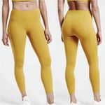Athleta NWT  ultimate stash 7/8 pocket leggings mustard yellow gold xs Photo 1