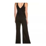 Bebe  Women's XL Black V-Neck Jumpsuit with Open Leg Slits Photo 1