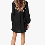 Boutique Black V Neck Ruffle tunic Dress sz small. Photo 1