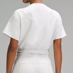 Lululemon Softstreme Gathered T-Shirt  Peach-fuzz soft texture Feels smooth next to skin Four-way stretch Quick-drying Weighty drape Machine washable. Water drops can easily mark this fabric—a simple wash will remove them  ColourLight Vapor Photo 5