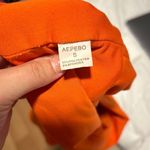 Bright Orange Cropped Top Photo 2