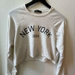 Michelle by Comune long sleeve cropped sweatshirt, cream, size large Photo 0