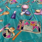 Vintage 100% silk scarf by Cordello. Motif features items from a vanity table. Green Photo 1