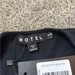 Motel Rocks  Bow Tank Photo 1