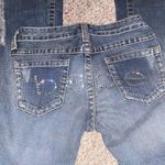Bebe Jeans Photo 1