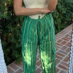 Green drawstring cargo pants Size M Photo 0