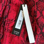 NWT MODERN FIT SNAKE PRINT SKIRT STRETCH RED SZ Photo 5