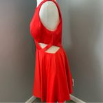 Sherri Hill short red dress with cutouts and a sheer neckline Photo 6
