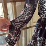 ASTR  Black and White Floral Romper with Bell Sleeves Photo 4