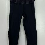 Lululemon Size 8 Black, Purple Crop Ruffle Ankle Trim Leggings with Zip Pocket Photo 1