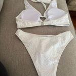 Zaful Chic cream bikini with heart accents. Halter top and matching bottoms. Perfect for beach days. Photo 5