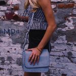 Hayden Harnett crossbody bag in a light blue shade with whipstitch detailing Photo 4