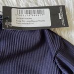 Pretty Little Thing  Women’s Rib Long Sleeve Thumb Hole Jumpsuit in Navy size 10 Photo 3