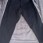 Adidas  Women's Black Joggers with White Stripes Photo 2