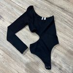 Boutique Black Cut Out Ribbed Bodysuit Photo 2