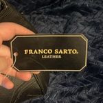 Franco Sarto  black leather bag. Red interior. Used with small minimal tears. Photo 3
