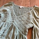 American Eagle AE Long-Sleeve Smocked Babydoll Top Green Photo 3