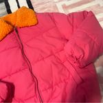Urban Outfitters  Vibrant Pink Puffer with Bold Orange Collar Photo 1
