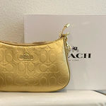Fashion Metallic Gold Embossed Purse Photo 0