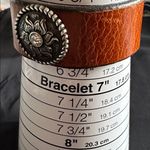 Leather EUC snap bracelet with silvertone medallion and CZ center stone Brown Photo 7