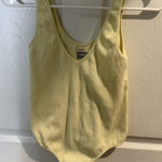 Colsie Pale Yellow Bodysuit Photo 0