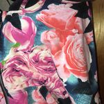 Lululemon Hold Your Om Hoodie
Secret Garden / Black size 6 floral top Photo 7