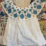 White Embroidered Sleeveless Blouse Photo 0