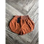 Alphalete  Woman’s Infinity Stride Short W/ Liner - Sour Tangerine, Size Small Photo 1