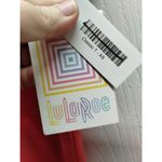 LuLaRoe  NWT Size XS Classic Tee Coral Short Sleeves Navy Blue Trim High Low Top Photo 4