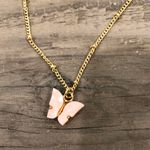 Urban Outfitters Butterfly Light Pink Necklace Photo 1