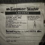 Lacoste The product is a pair of Women's Cigarette Leg Jeans in low rise gray, size 28 Photo 5