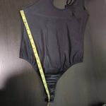 We Wore What  Black Asymmetrical Bodysuit NWT Size Small Revolve Black Bodysuit Photo 10
