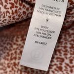 Athleta Leggings Womens Small Orange Salutation Stash II Textured Tight Gym Run Photo 3