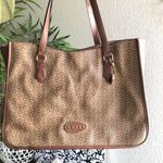 GUESS brown and tan tote monogram hand shoulder bag purse. Some wear as pictured. Great for work school college university. Can fit most books laptops. Photo 0