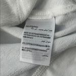 Karen Scott  White Vest Photo 12