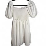 Size medium flowy white dress with runching in the back and puffy sleeves Photo 3