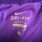 Nike  purple and black running shorts with embroidered logo Photo 3