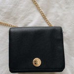 Kendall + Kylie Crossbody black hand bag with gold detailing Photo 0
