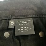 GRLFRND Joan Crop Flare Jeans in the Color Black Magic Woman Photo 9