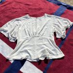 EXPRESS cream white flowy blouse - zip up backing
Women’s size XS Photo 0