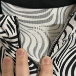 Tail White Label Women's Large Golf Pickleball Top Black White Print 1/4 Zip Photo 1