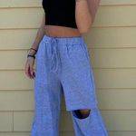 love and honey boutique wide leg butterfly sweatpants with knee slit Photo 1
