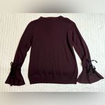 Ivanka Trump  purple sweater Photo 1